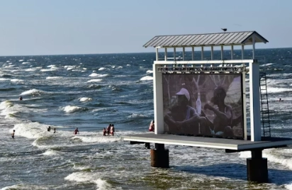 an LED display board by the seaside